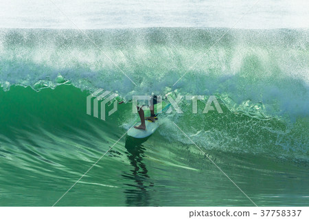 Surfer Surfing Tube Ride Surfer Surfing Tube Ride 37758337