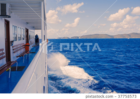 View of the Greek island and little yacht 37758573