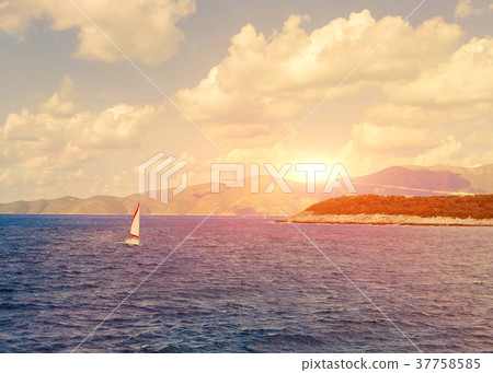 View of the Greek island and little yacht View of the Greek island and little yacht 37758585