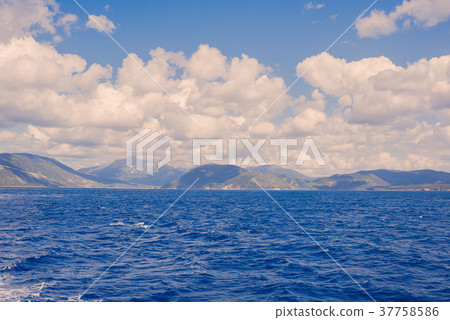 View of the Greek island and little yacht 37758586