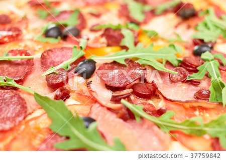 Salami pizza background. 37759842
