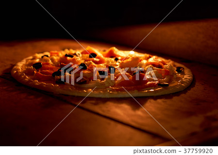 Pizza baking in oven. Pizza baking in oven. 37759920