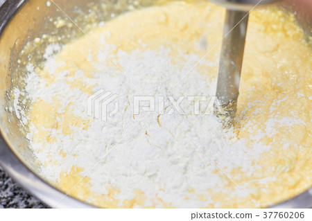 White dough on mixed yellow dough. 37760206