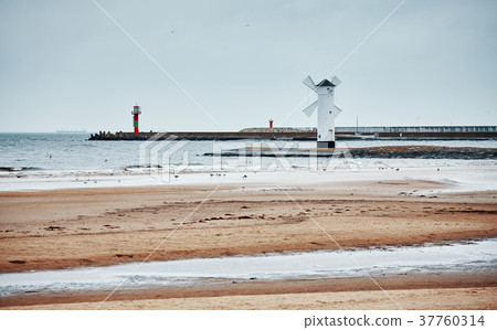 Windmill lighthouse in Swinoujscie, Poland. Windmill lighthouse in Swinoujscie, Poland. 37760314