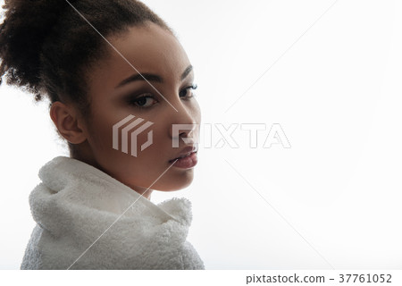 Female cared visage with serene eyes 37761052