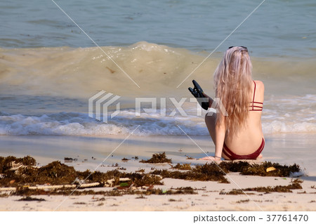 European girl with highlight hair style on beach European girl with highlight hair style on beach 37761470