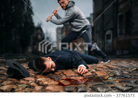 Thief kills his victim with baseball bat Thief kills his victim with baseball bat 37761573
