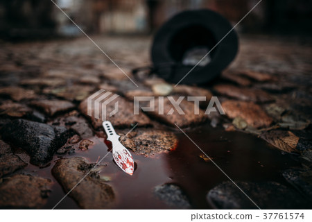 Bloodied murder weapon, crime concept Bloodied murder weapon, crime concept 37761574