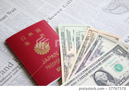 Passport and dollar bill 37767378