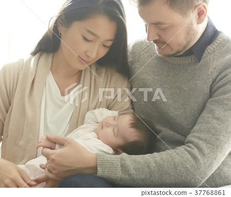 International marriage couple baby 37768861