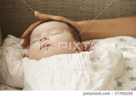 Sleeping Baby On The Couch Stock Photo 37769290 Pixta
