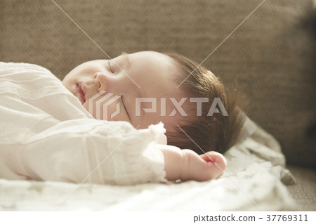 Sleeping Baby On The Couch Stock Photo 37769311 Pixta