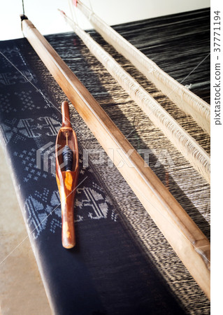 Silk loom. Traditional weaving of Thai cotton.  37771194