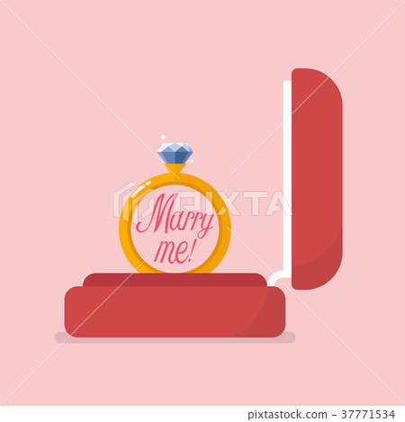 Red velvet box containing engagement ring 37771534