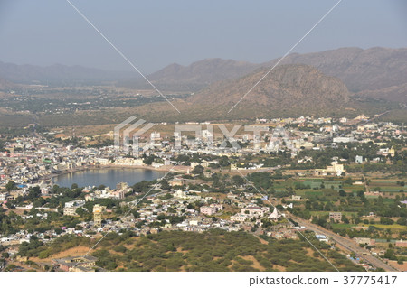 State and cityscape of camel festival seen from Hindu temple on the peak of Pushkar peak in India 37775417