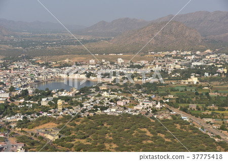 State and cityscape of camel festival seen from Hindu temple on the peak of Pushkar peak in India 37775418