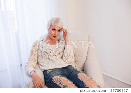Portrait of beautiful blonde girls with short hair Portrait of beautiful blonde girls with short hair 37780537