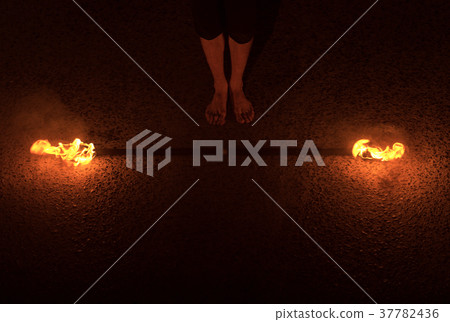 Fire Performance by a Man at Night 37782436
