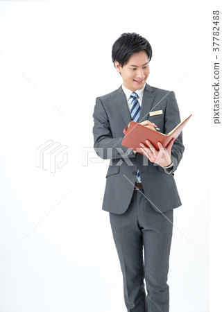 Consultant with a notebook Consultant with a notebook 37782488