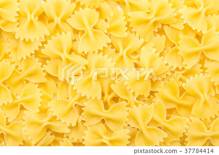 Raw fresh farfalle isolated on white Raw fresh farfalle isolated on white 37784414