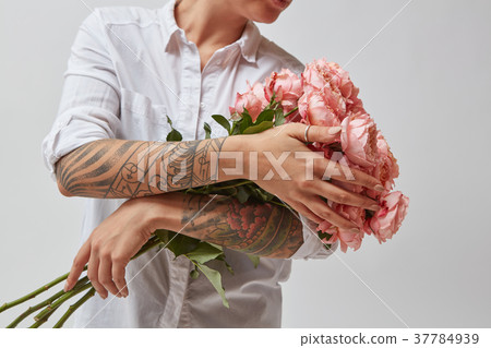 girl with a bouquet of flowers mother's day 37784939