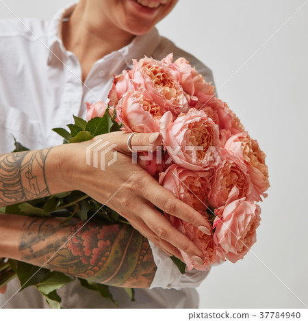 girl with a bouquet of flowers mother's day girl with a bouquet of flowers mother's day 37784940