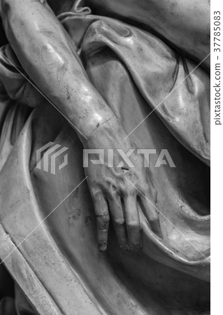 stone statue detail of human hand 37785083