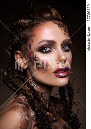 Fashion model with bright makeup and colorful Fashion model with bright makeup and colorful 37786339