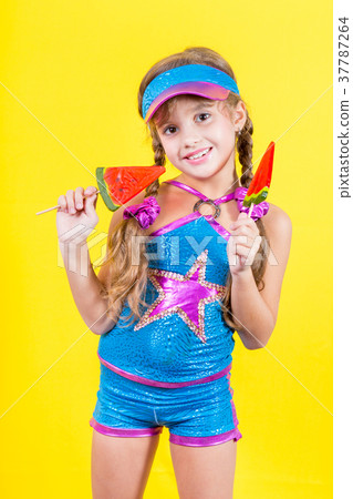 Beautiful little girl with large Lollipop Beautiful little girl with large Lollipop 37787264