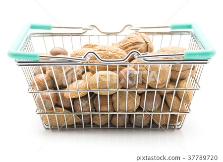 Raw mixed nuts isolated on white 37789720