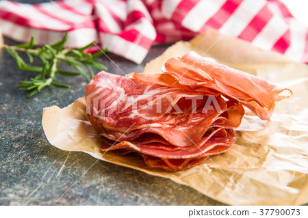 Sliced prosciutto crudo. Sliced prosciutto crudo. 37790073