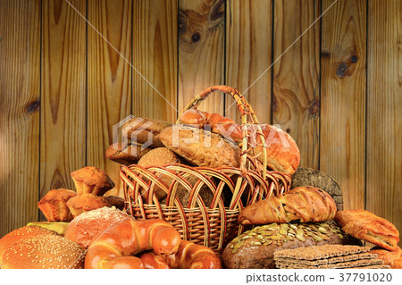Bread products on background wooden wall.   37791020