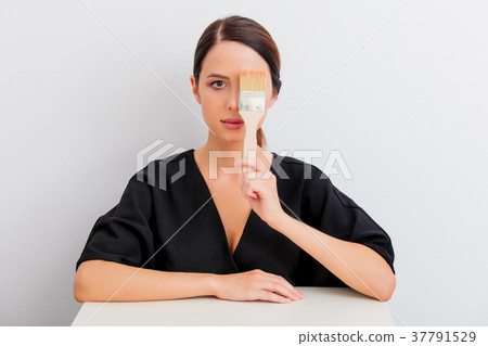 portrait of woman with brush in lagom style 37791529