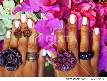 bright colorfull shot of african tanned hands with 37792211
