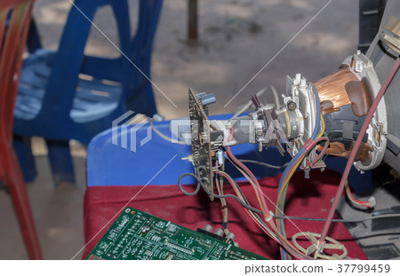 Parts of the television screen waiting for repairs Parts of the television screen waiting for repairs 37799459