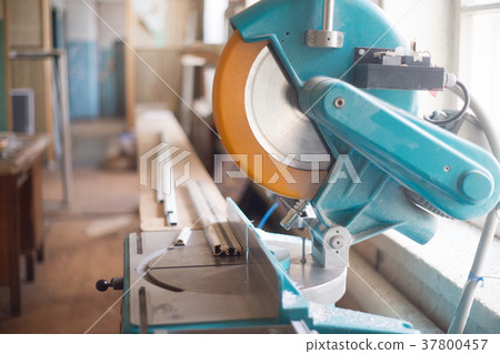 Blue and yellow circular cross-cut electric saw 37800457