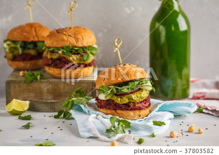 Vegan beet chickpea burgers with vegetables Vegan beet chickpea burgers with vegetables 37803582