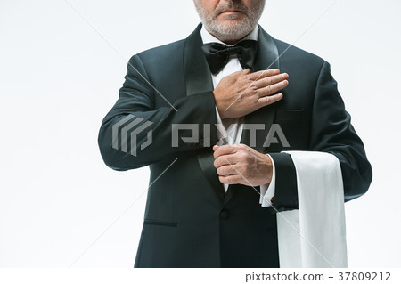 Senior waiter with white towel. Sign language in Senior waiter with white towel. Sign language in 37809212