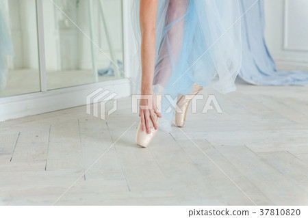 Ballerina puts pointe shoes Ballerina puts pointe shoes 37810820