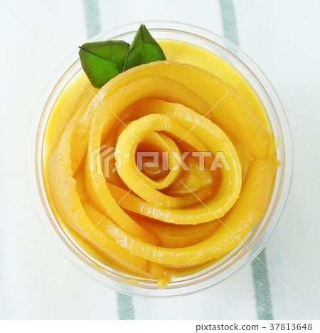 Top View of Fresh Ripe Mango Cheesecake 37813648