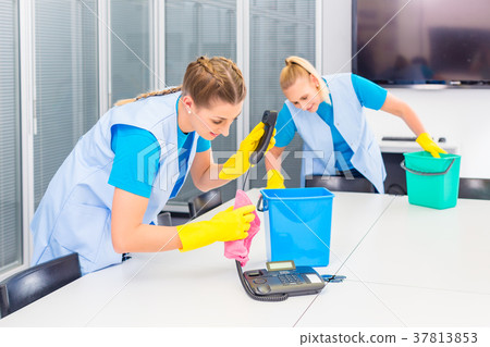 Cleaning ladies working in office 37813853