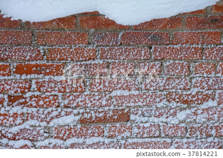 snow wall of red brick.background snow wall of red brick.background 37814221