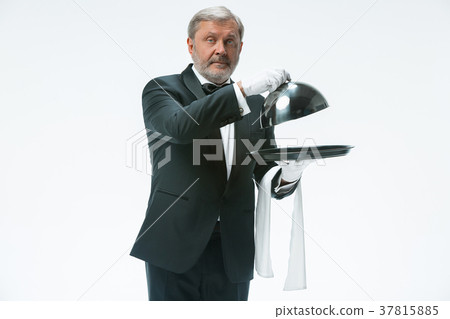 The waiter with tray and metal cloche lid cover 37815885