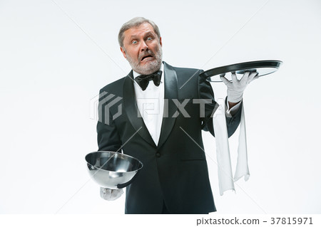The waiter with tray and metal cloche lid cover 37815971