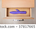 Sex toy in open countering bedside table 37817665