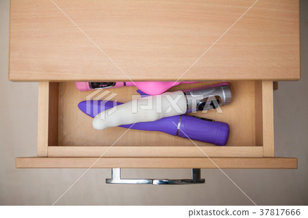 Sex toy in open countering bedside table 37817666