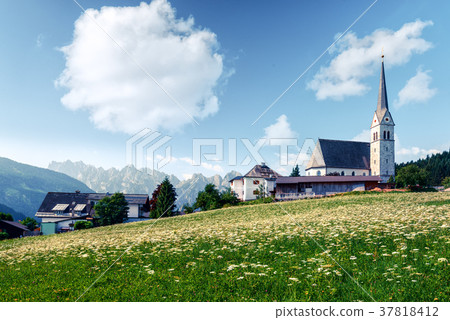Christianity churh in Gosau village at sunny day. 37818412