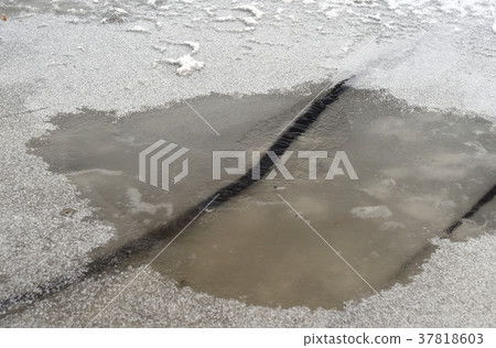 The crack with water in the ice. The crack with water in the ice. 37818603