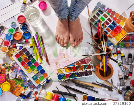 Authentic paint brushes still life on floor in art 37819360