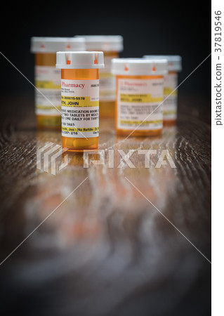 Variety of Non-proprietary Prescription Bottles 37819546